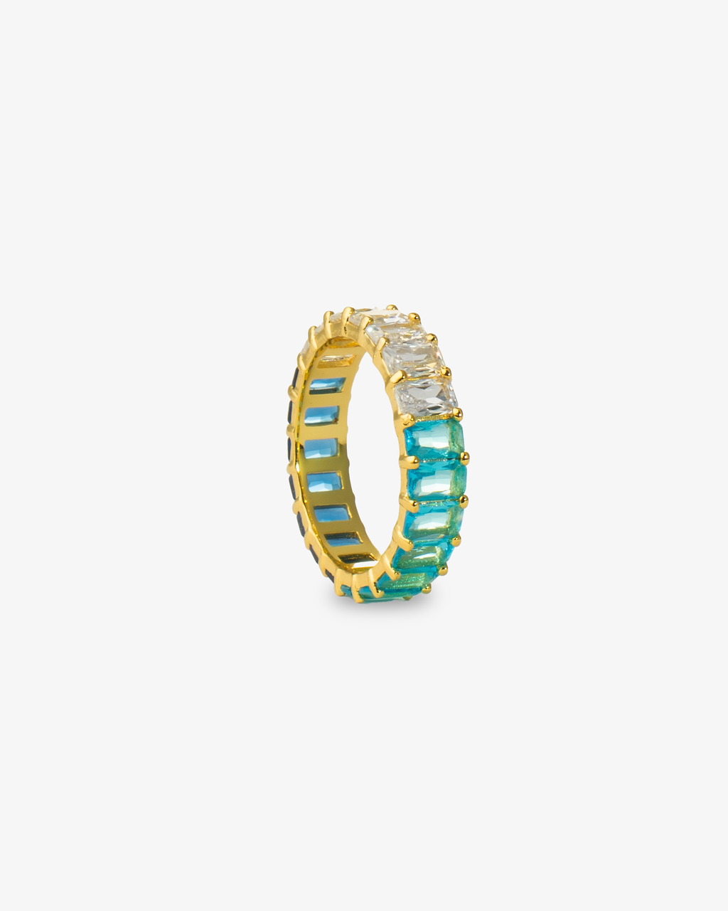 Gold eternity ring with teal-to-green ombre simulated diamond stones, alone product shot on a plain background.