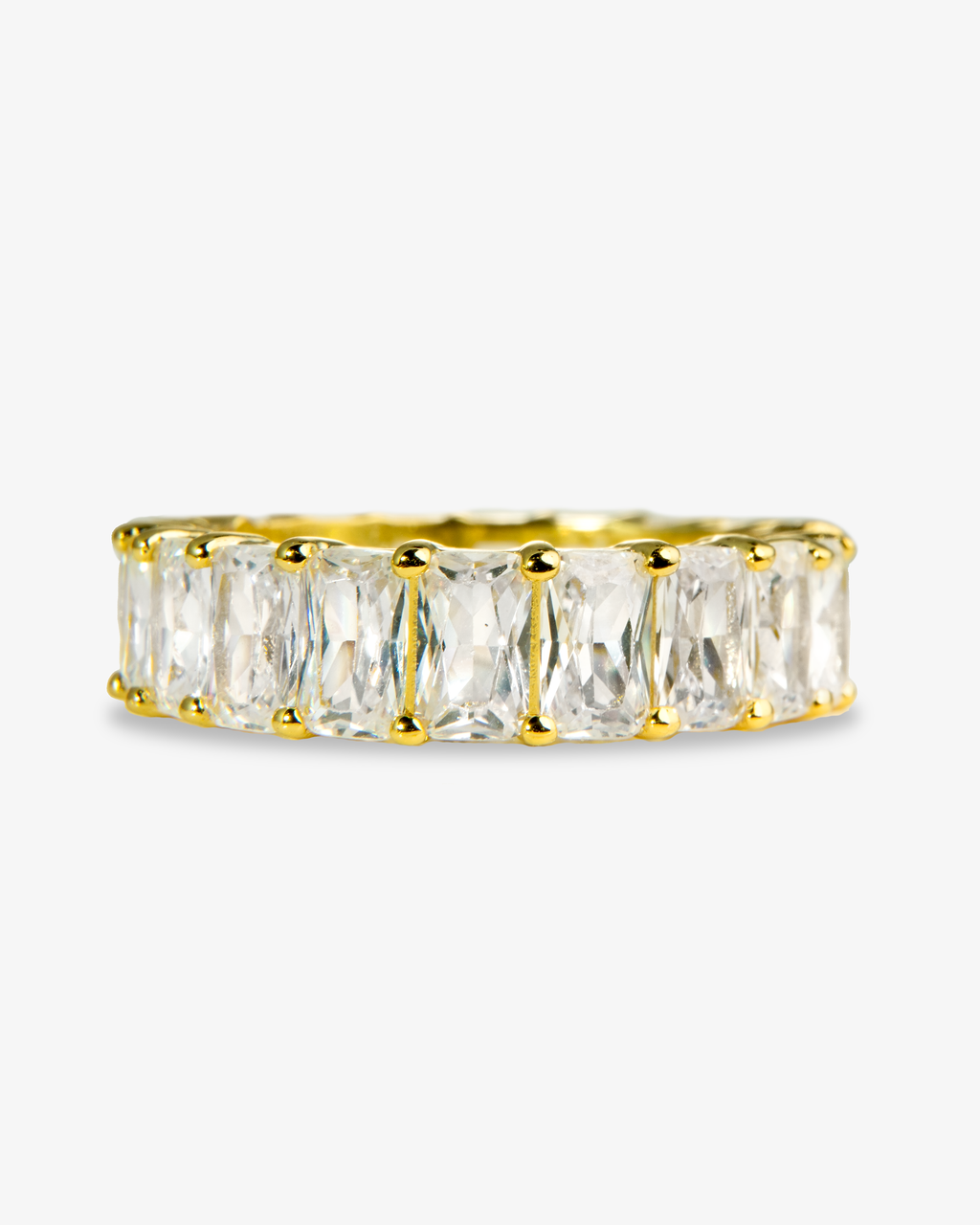 Gold baguette simulated diamond eternity ring, alone product shot from another angle.