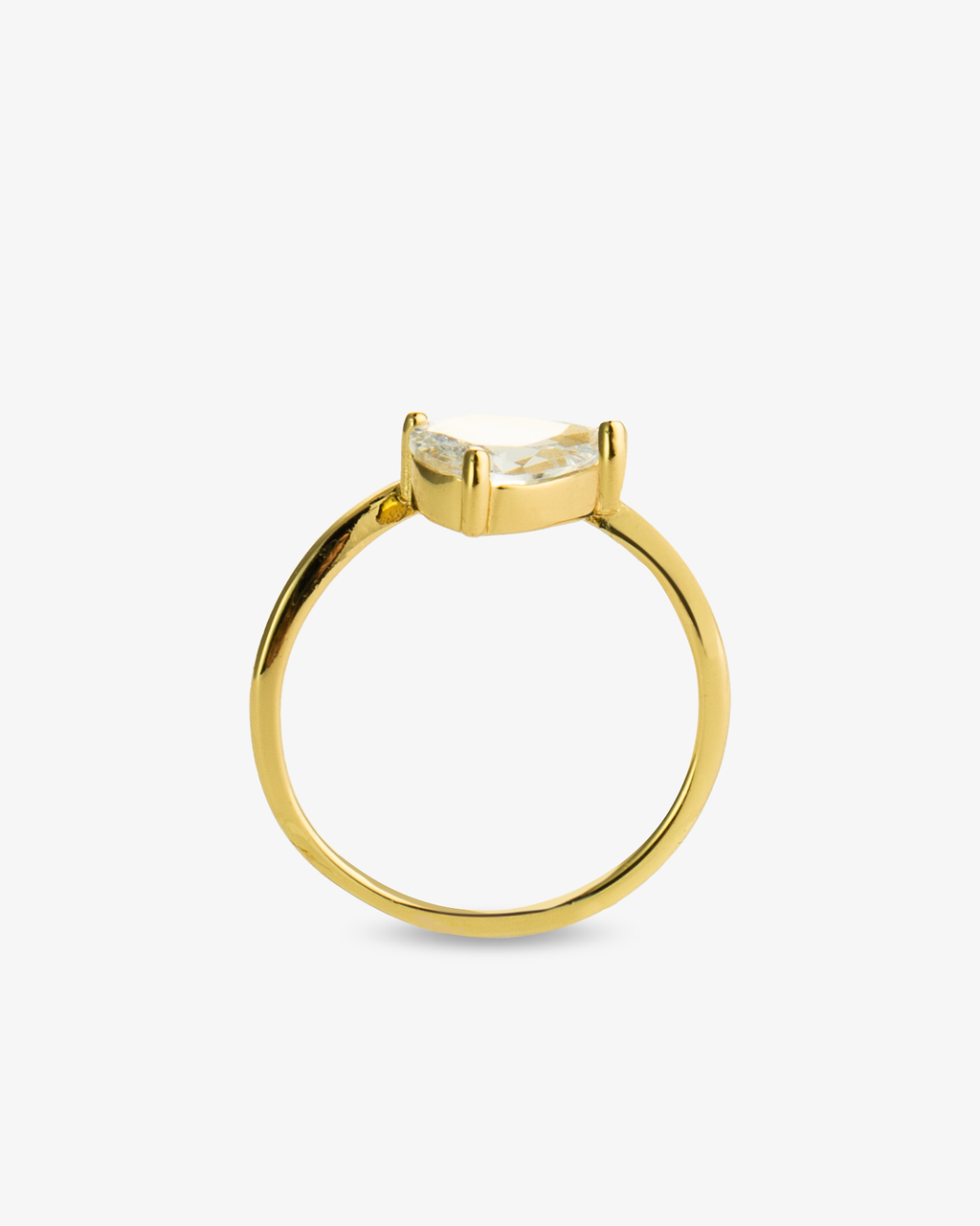 Gold pear-shaped simulated diamond pinky ring, alone product shot from a top-down angle.