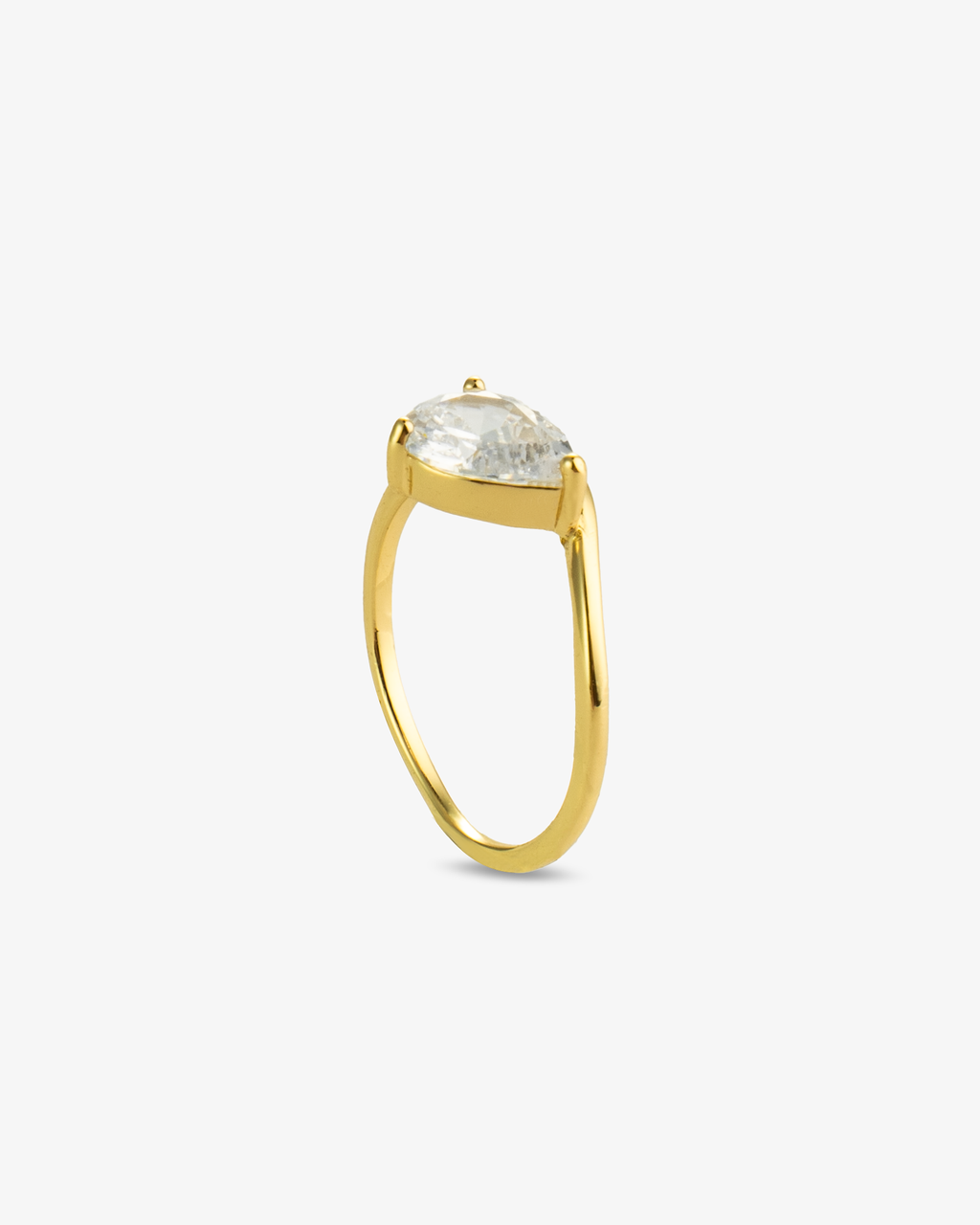 Gold pear-shaped simulated diamond pinky ring, alone close-up product shot from a side profile.