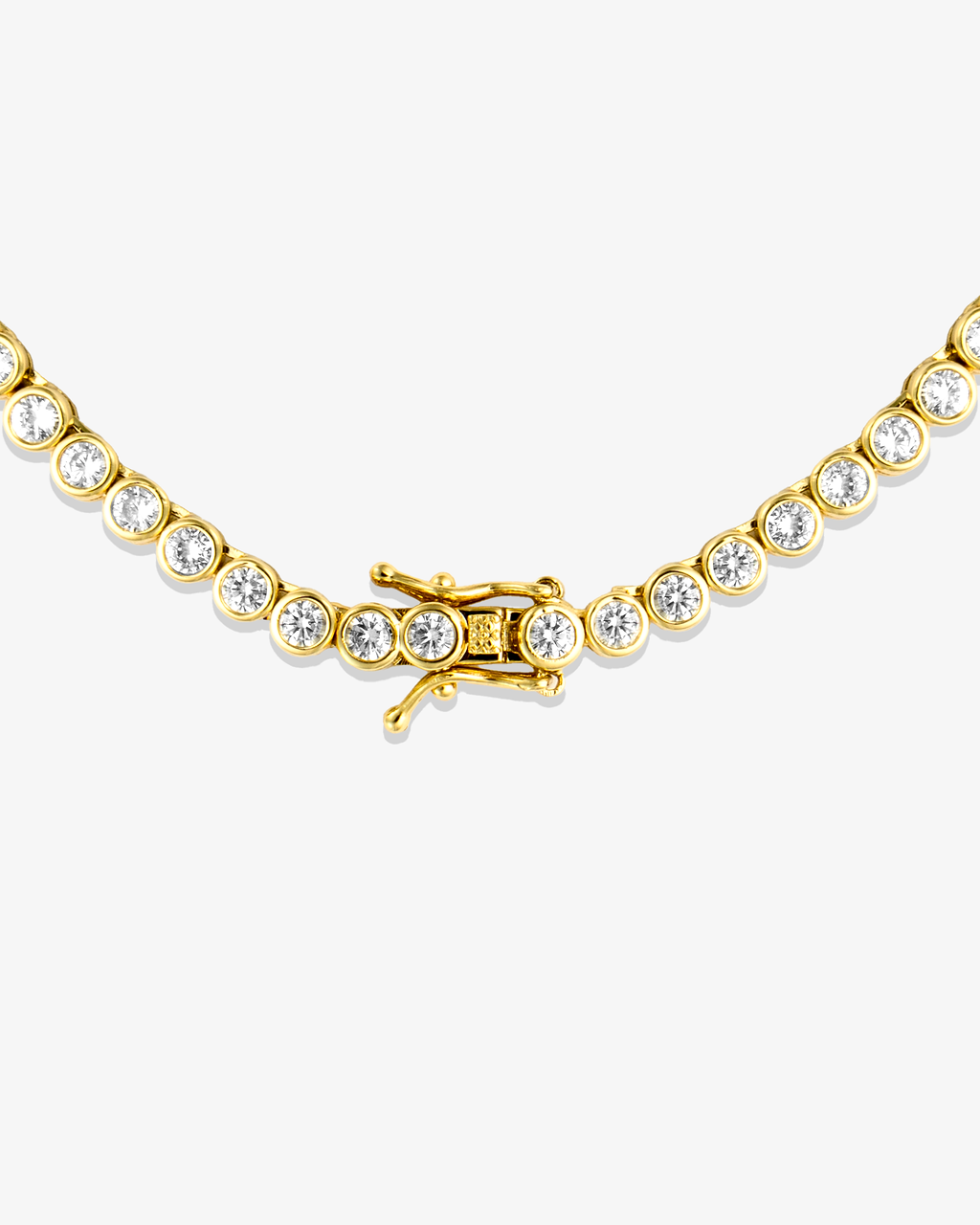 Gold round bezel-set tennis necklace, alone close-up product shot of the clasp.