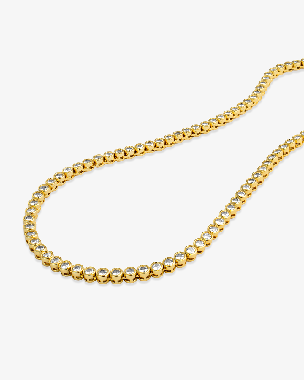 Gold round bezel-set tennis necklace, alone product shot from a different angle.