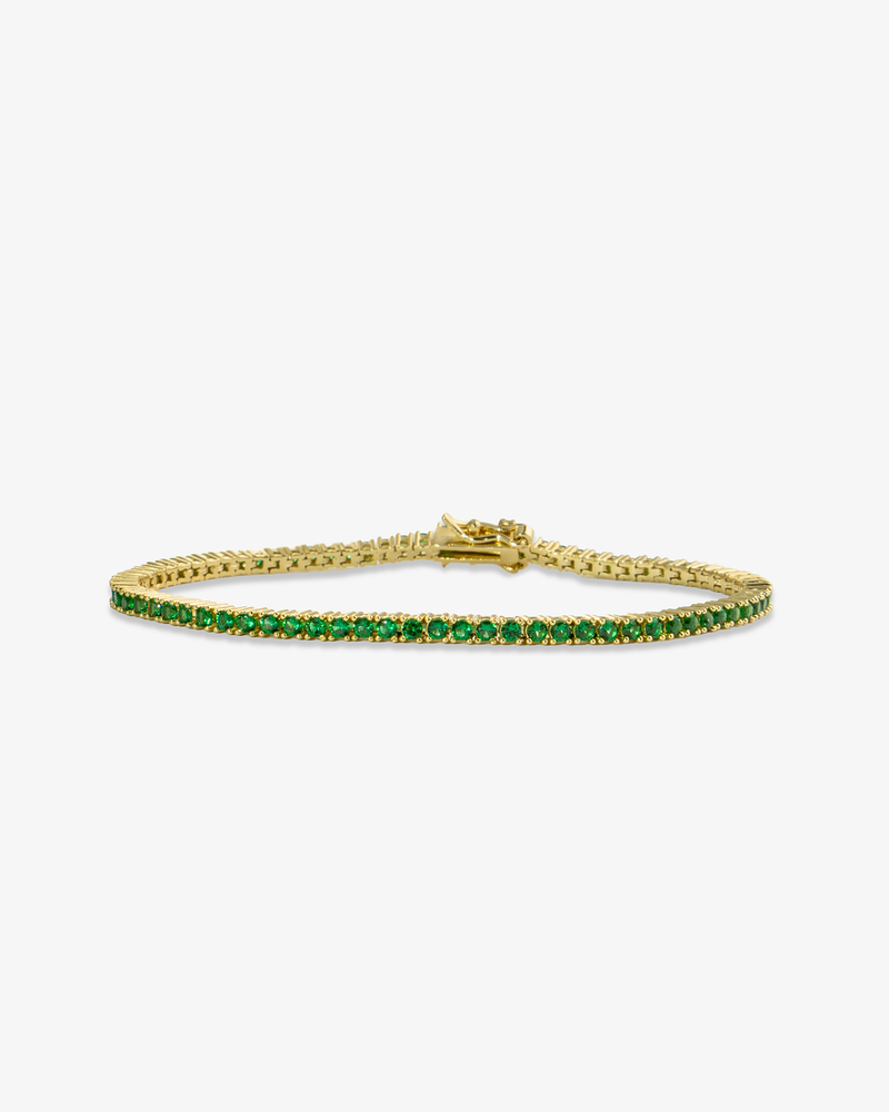Gold tennis bracelet with multicolor simulated diamond stones, alone product shot on a plain background.