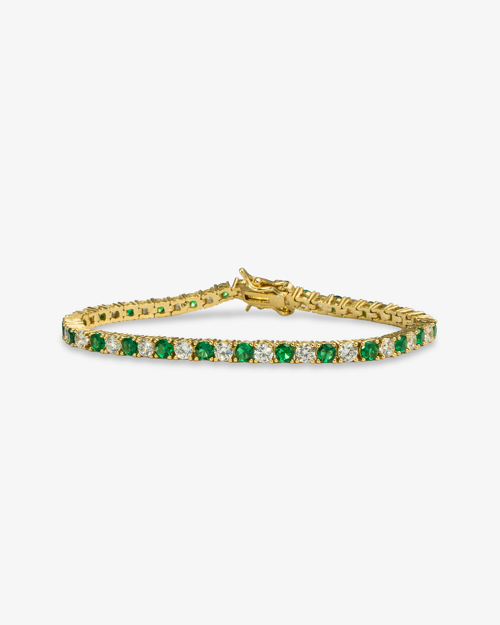 Gold tennis bracelet with green colored stone detailing, alone product shot on a plain background.