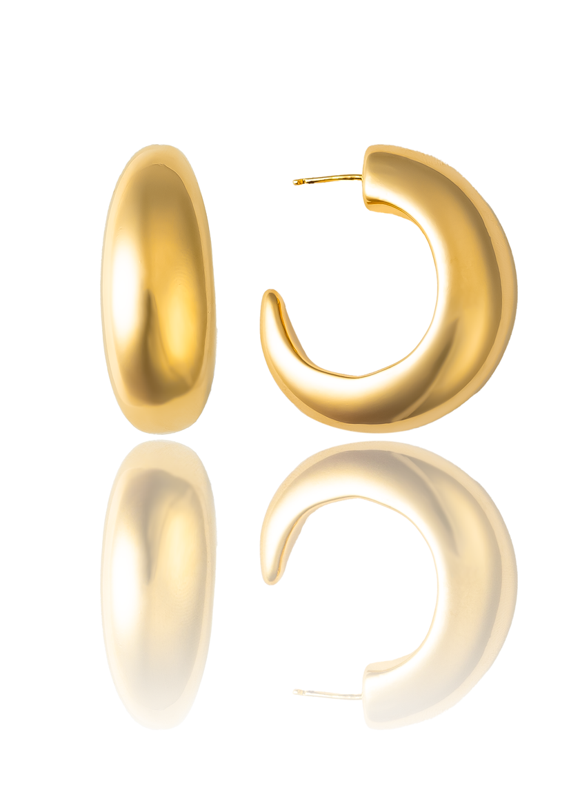 Large gold plated hoop earrings with thick sculptural curved design and polished finish, 38mm diameter