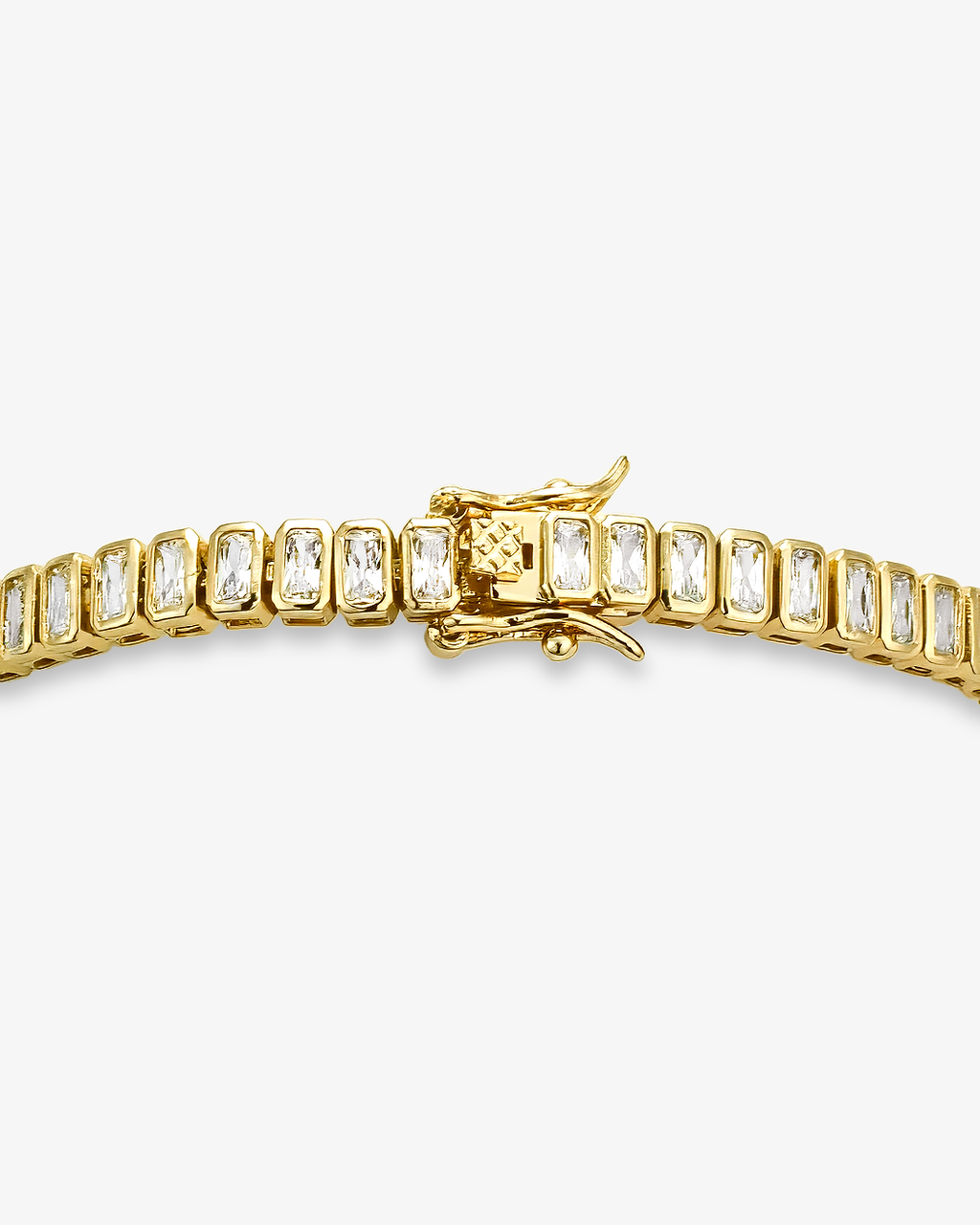 Gold emerald-cut tennis bracelet featuring rectangular clear stones in polished gold settings