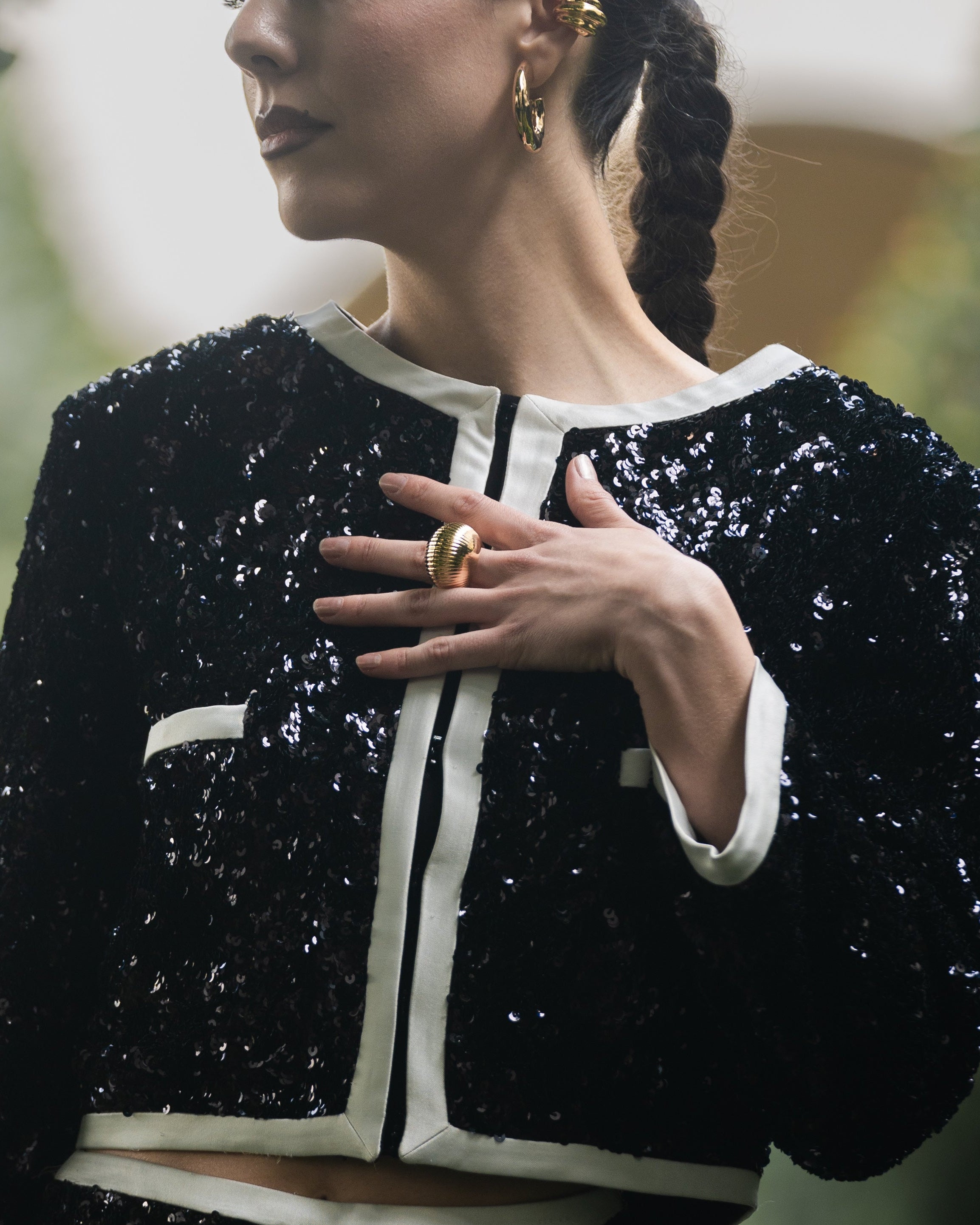Gold plated bold sculptural ring with solid form and polished finish