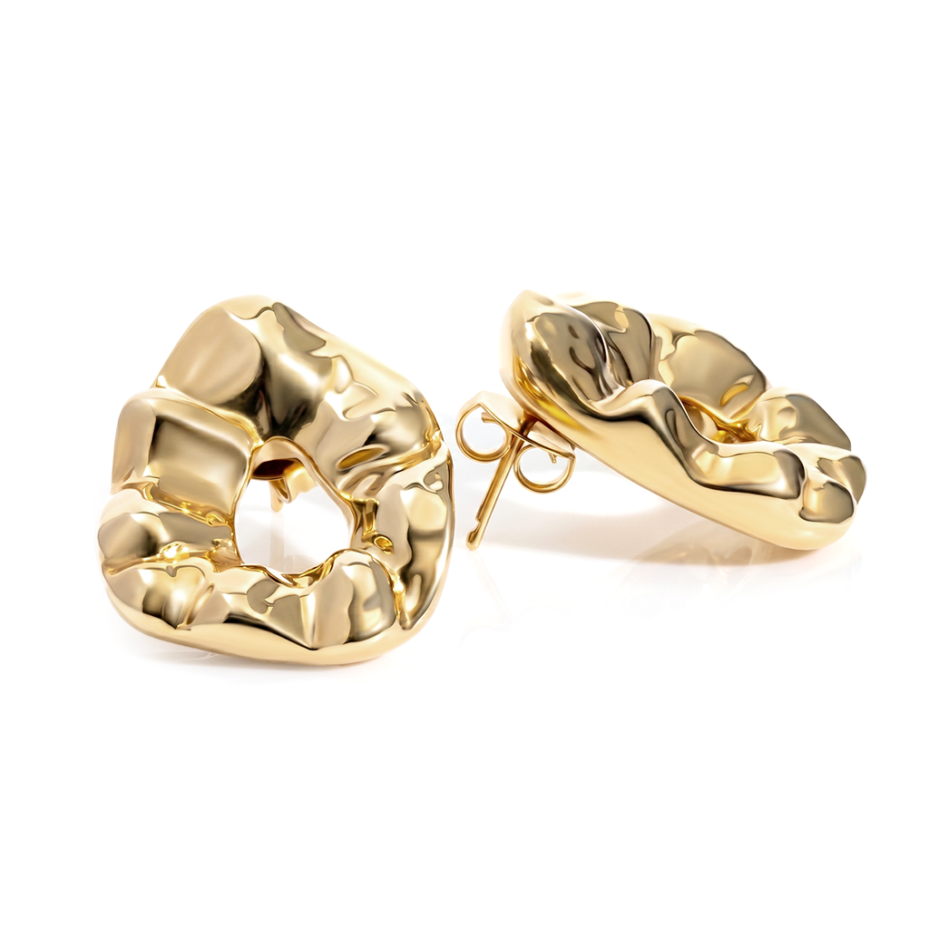 Sculptural hammered earrings available in gold plated and rhodium plated finishes with organic texture