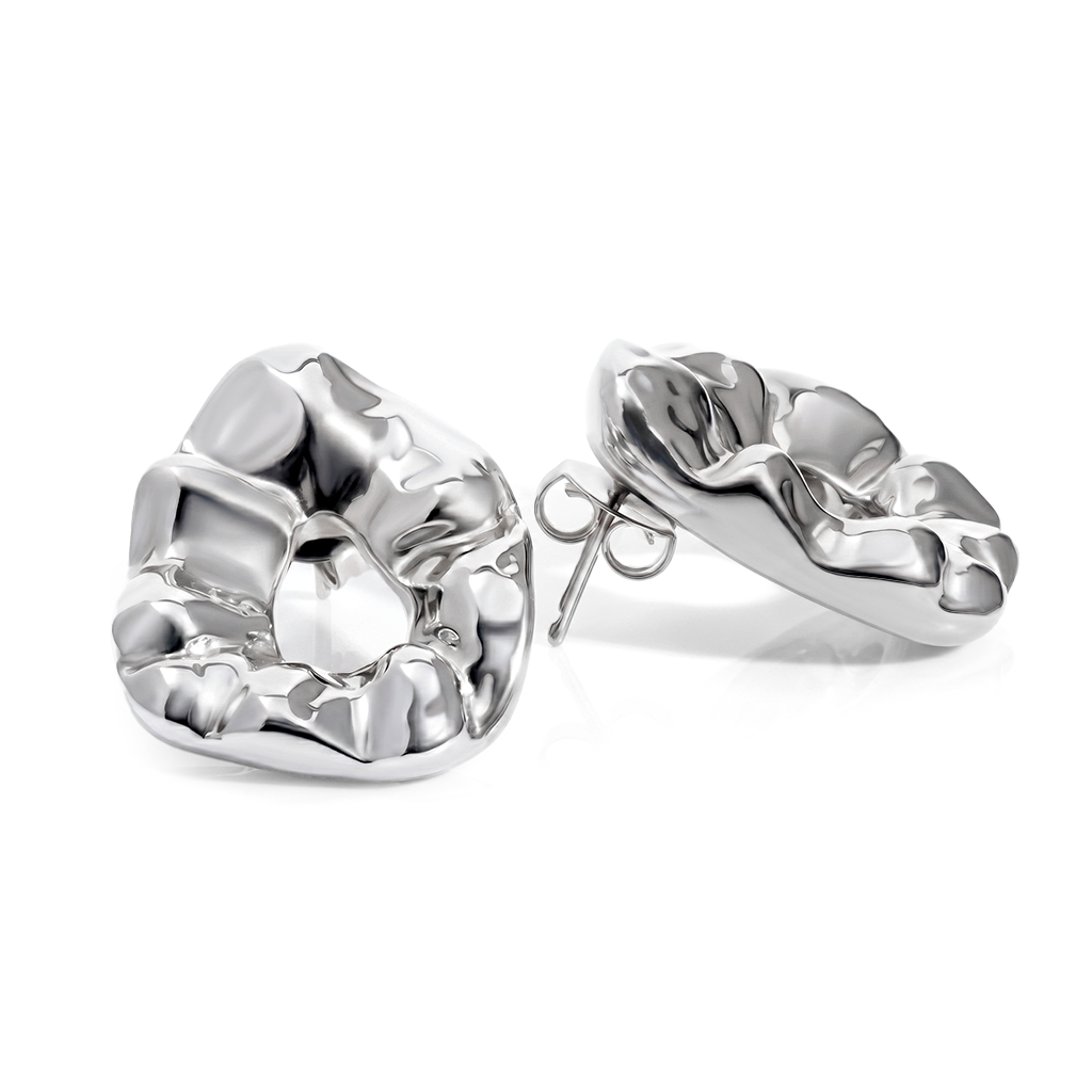 Sculptural hammered earrings available in gold plated and rhodium plated finishes with organic texture