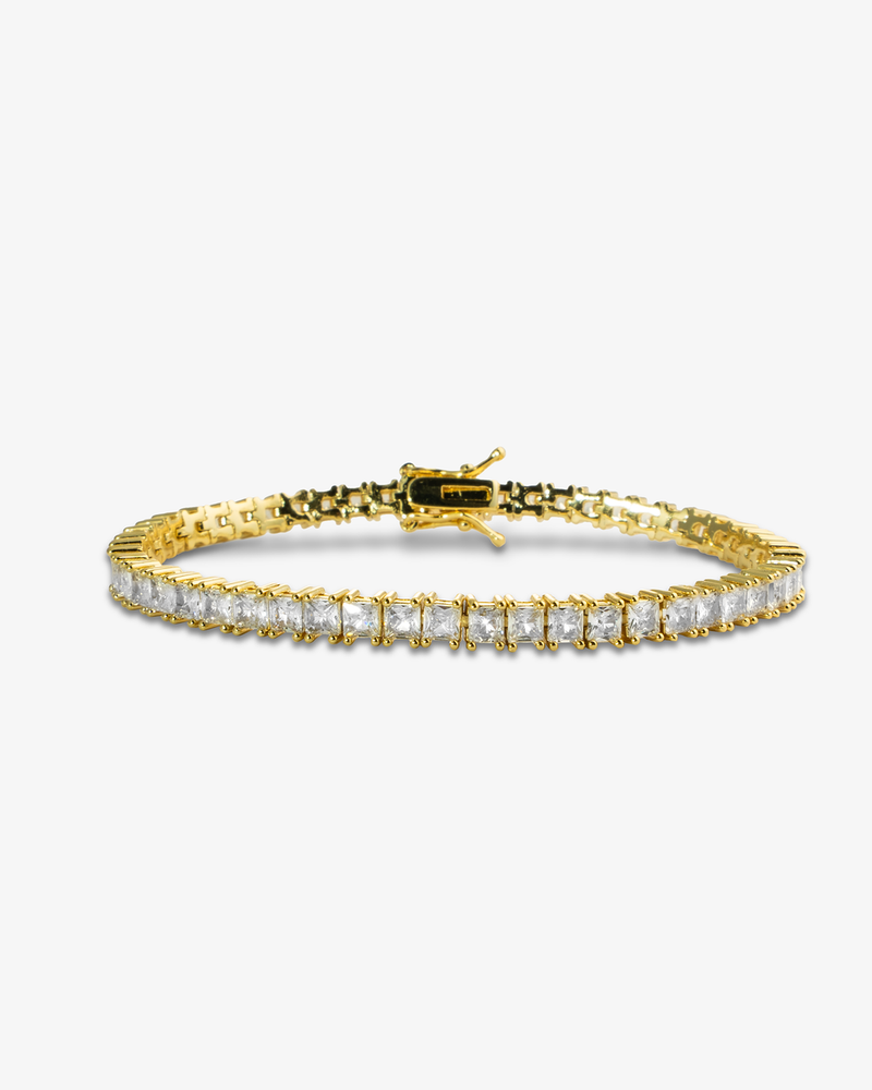 Gold square-cut simulated diamond tennis bracelet, alone product shot on a plain background.
