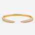 Gold pavé simulated diamond open cuff bangle bracelet, alone product shot on a plain background.