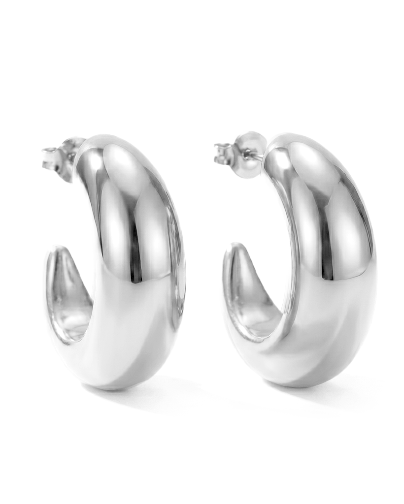 Large gold plated hoop earrings with thick sculptural curved design and polished finish, 38mm diameter