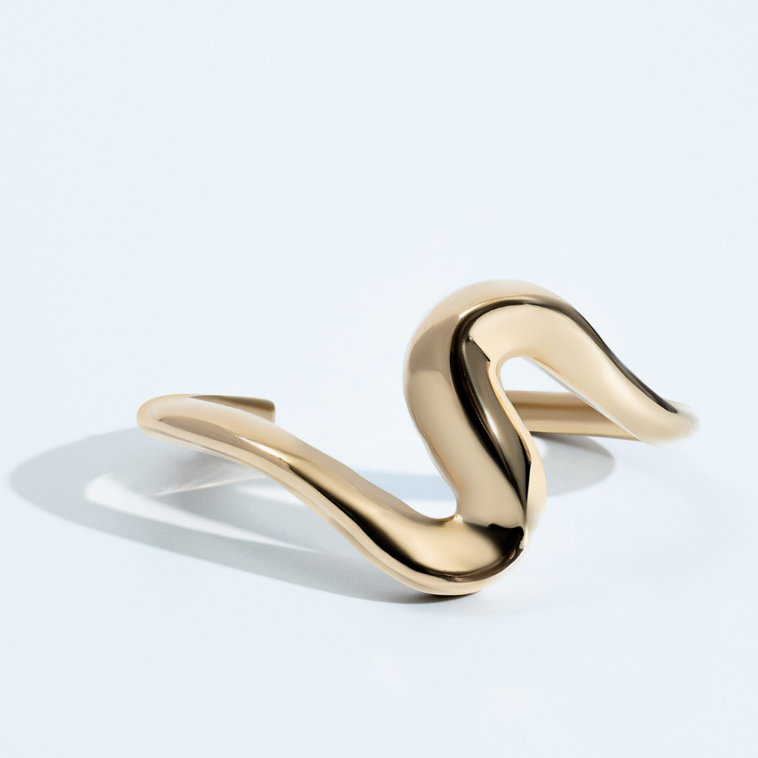 Gold sculptural cuff bracelet with S-shaped curves and 6mm thickness