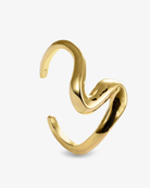 Polished sculptural gold cuff bracelet side view