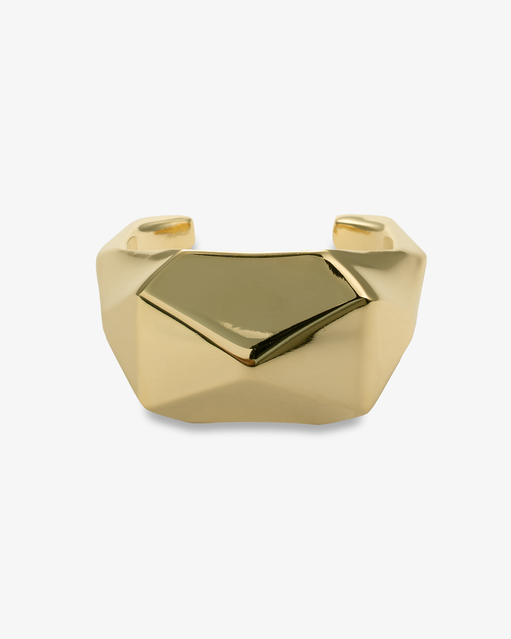 Gold sculptural geometric faceted cuff bracelet, alone product shot on a plain background.