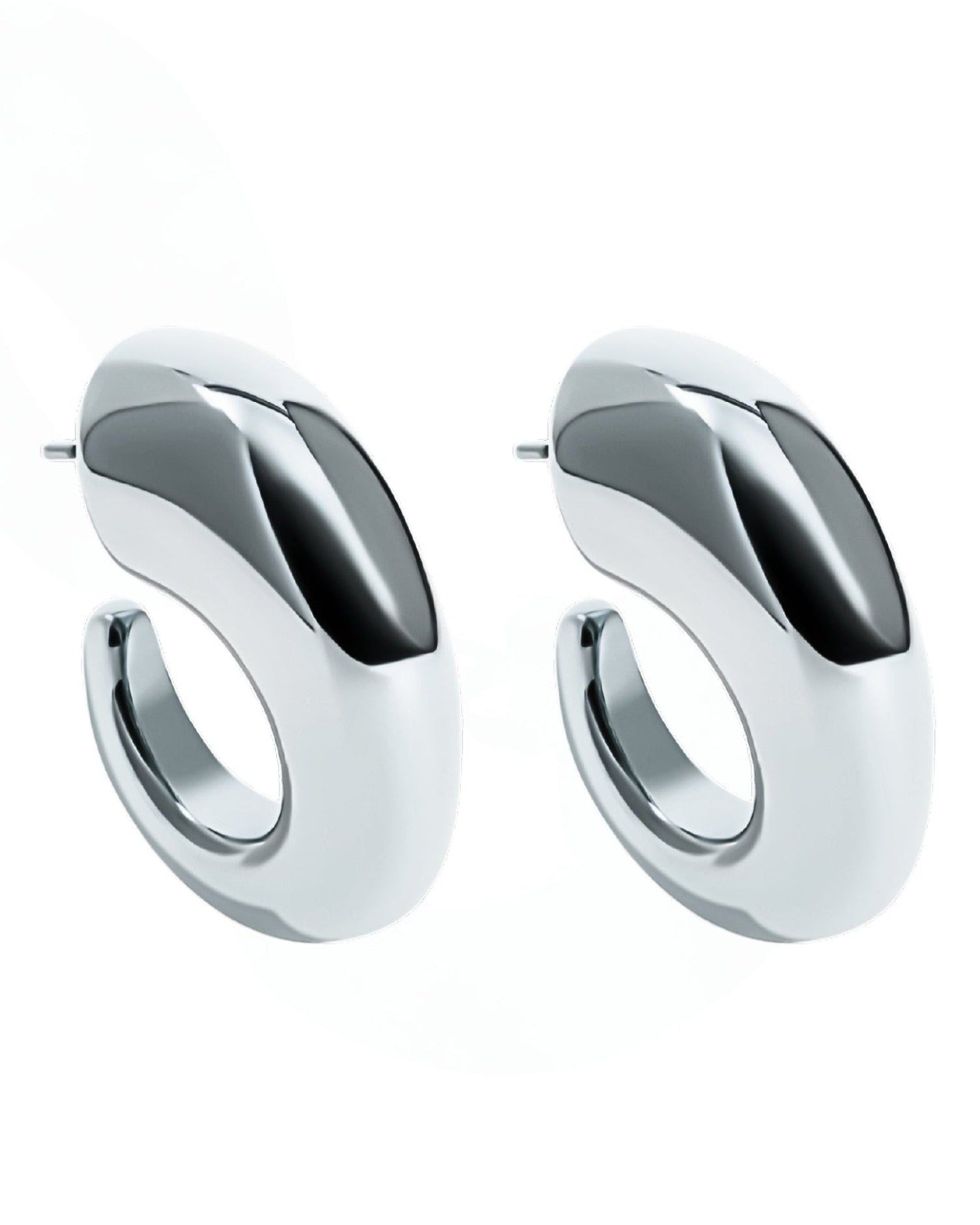 Oval open hoop earrings available in gold plated and rhodium plated finishes with sculptural thick design