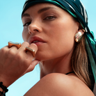 Gold geometric sculptural earrings with polished curved design