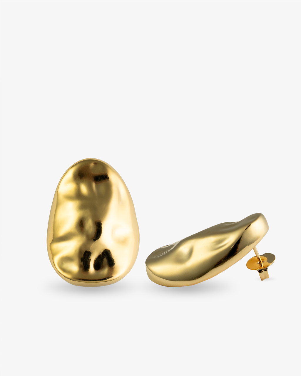 Sculptural teardrop gold earrings side view with post back