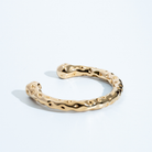 Gold molten textured cuff bracelet with organic sculptural design and 8mm thickness