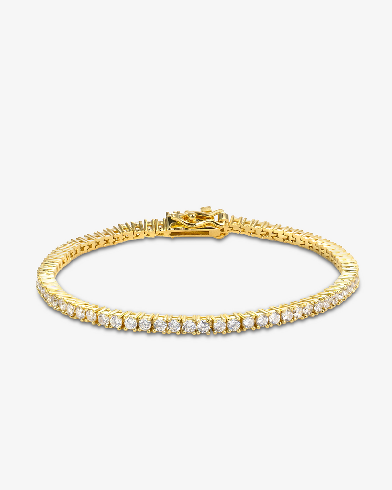 2mm gold tennis bracelet with round-cut clear stones and secure clasp