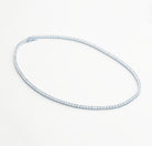 Tennis necklace and bracelet set with cubic zirconia stones available in gold plated and rhodium finishes