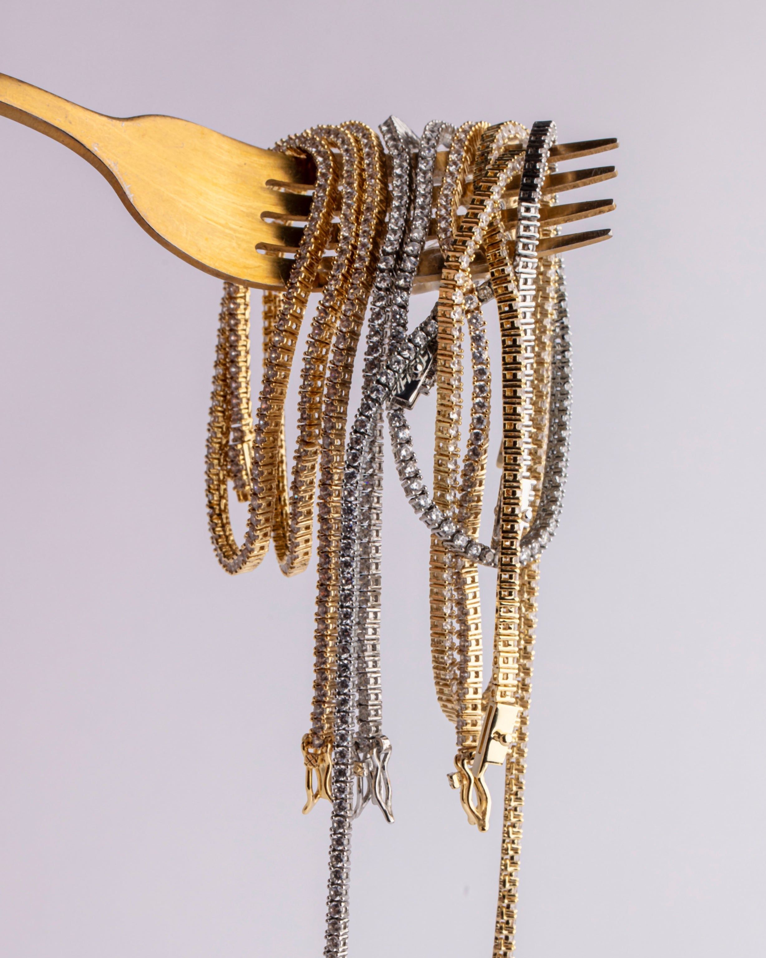Model wearing Cynthia 2MM Tennis Necklace — 18K gold-plated necklace by Denise Pacini
