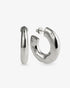 Chunky organic silver hoop earrings with sculptural curved shape and polished finish