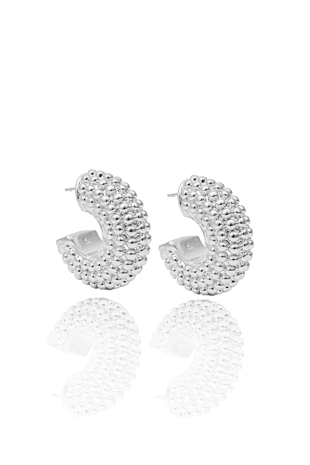 Thick beaded hoop earrings available in gold plated and rhodium plated finishes