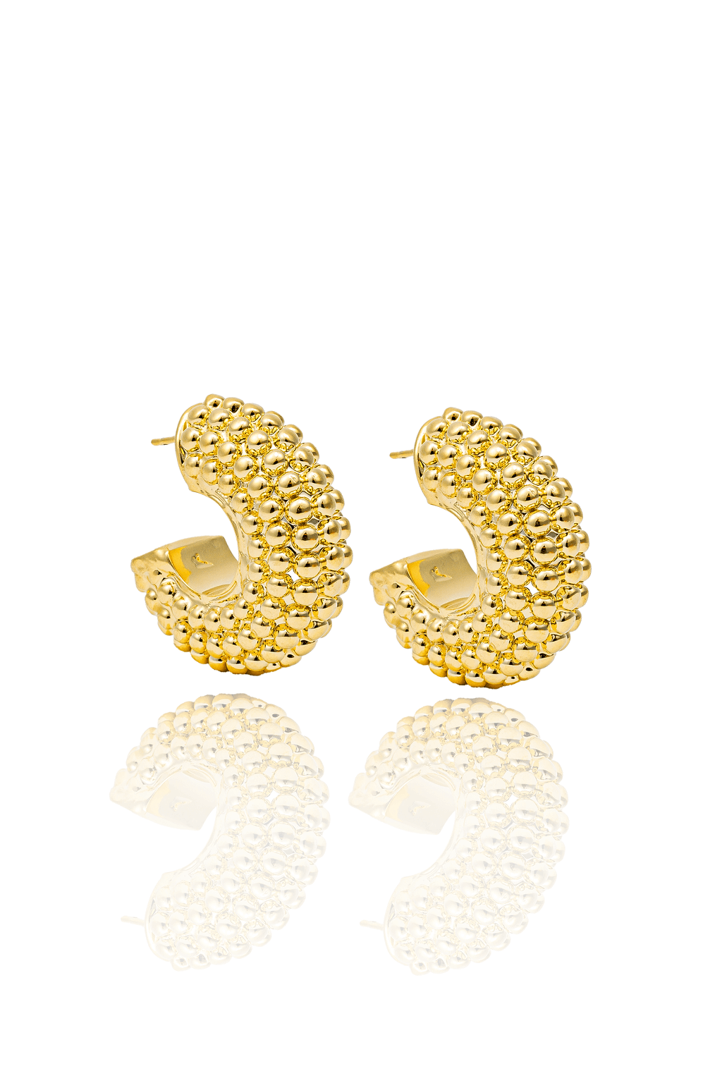 Thick beaded hoop earrings available in gold plated and rhodium plated finishes