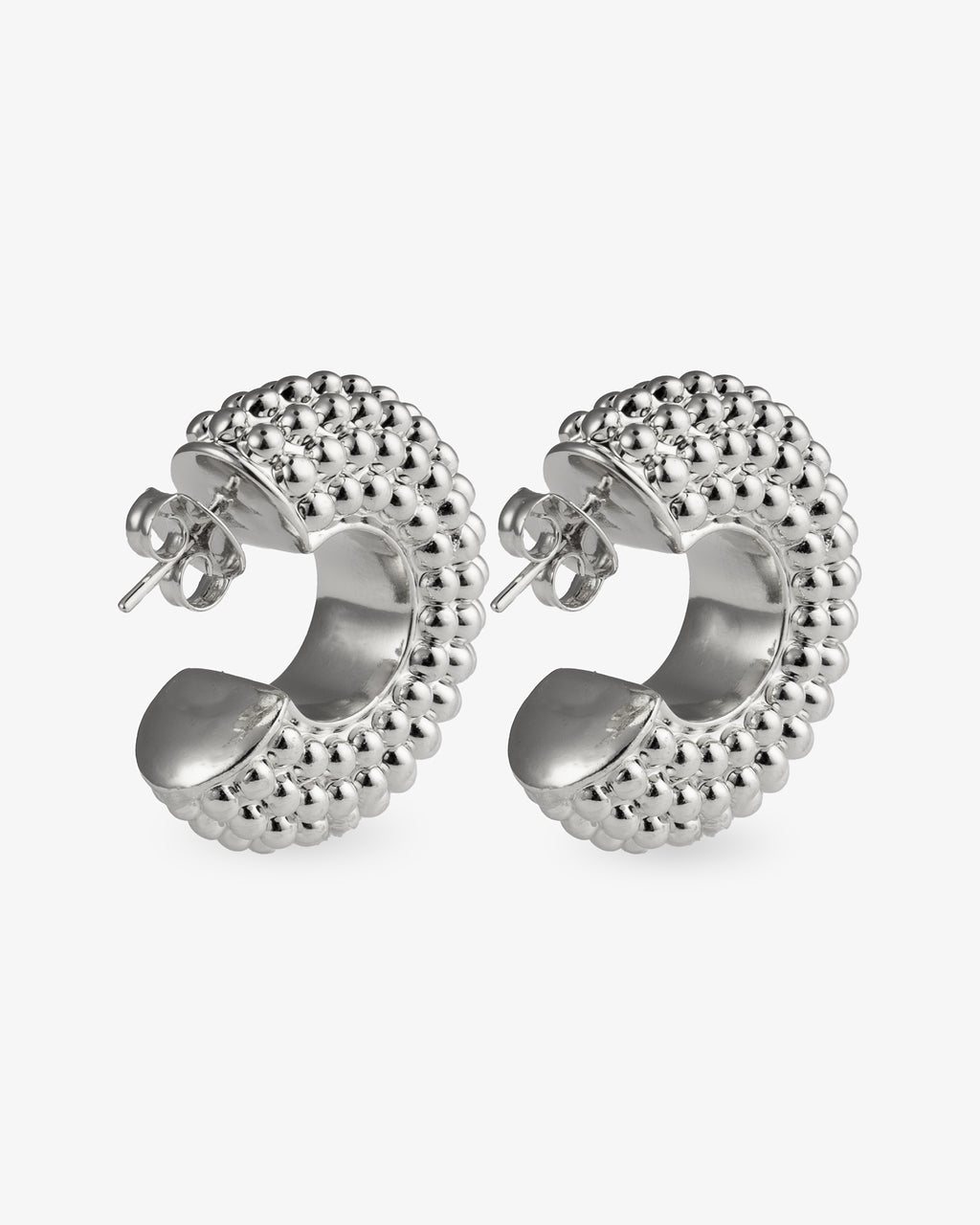 Chunky textured silver hoop earrings angled back view with post closure