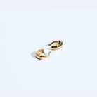 Gold thin ear cuff with minimal curved design and polished finish