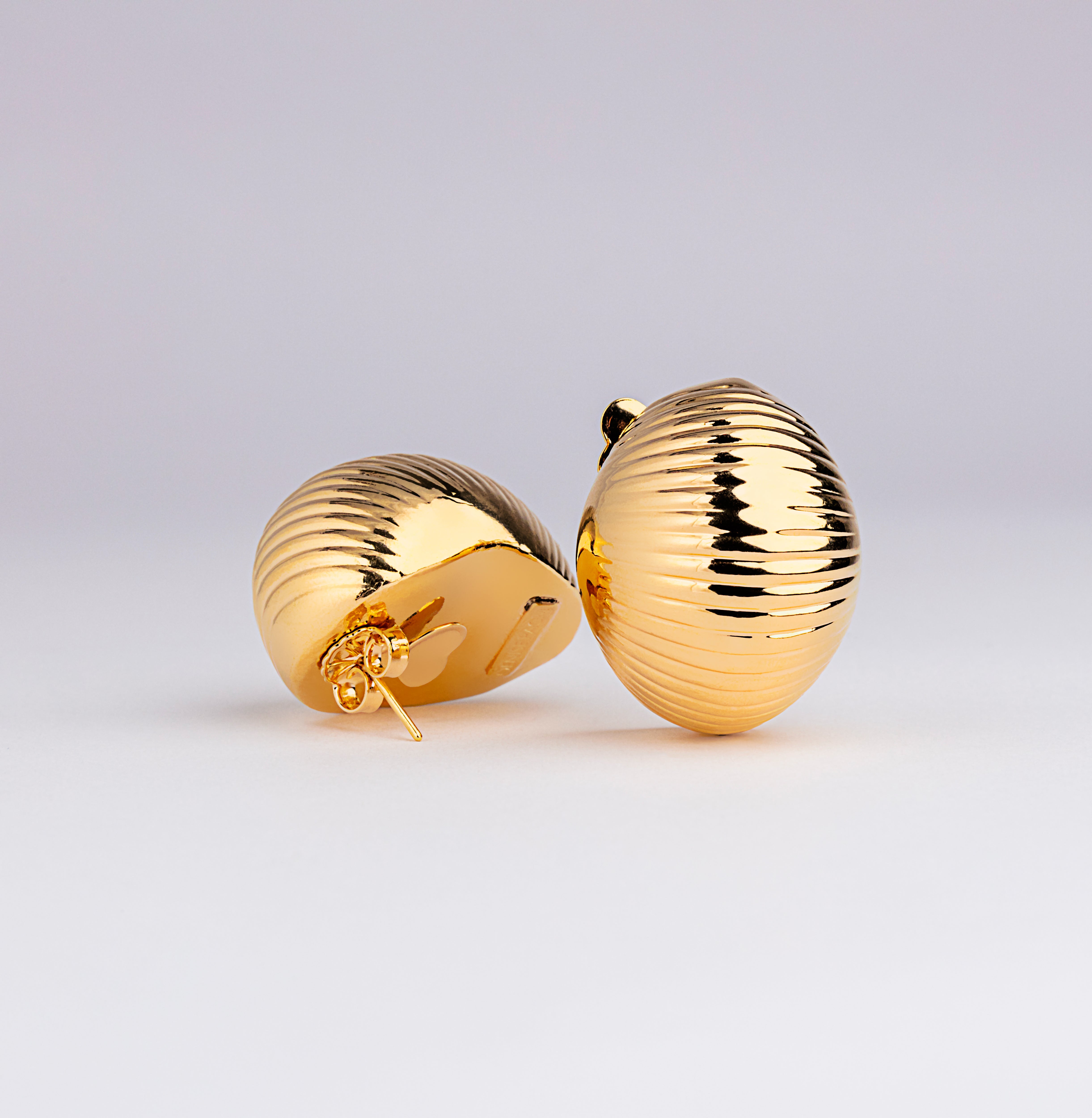 Gold plated dome earrings with textured surface and rounded compact design