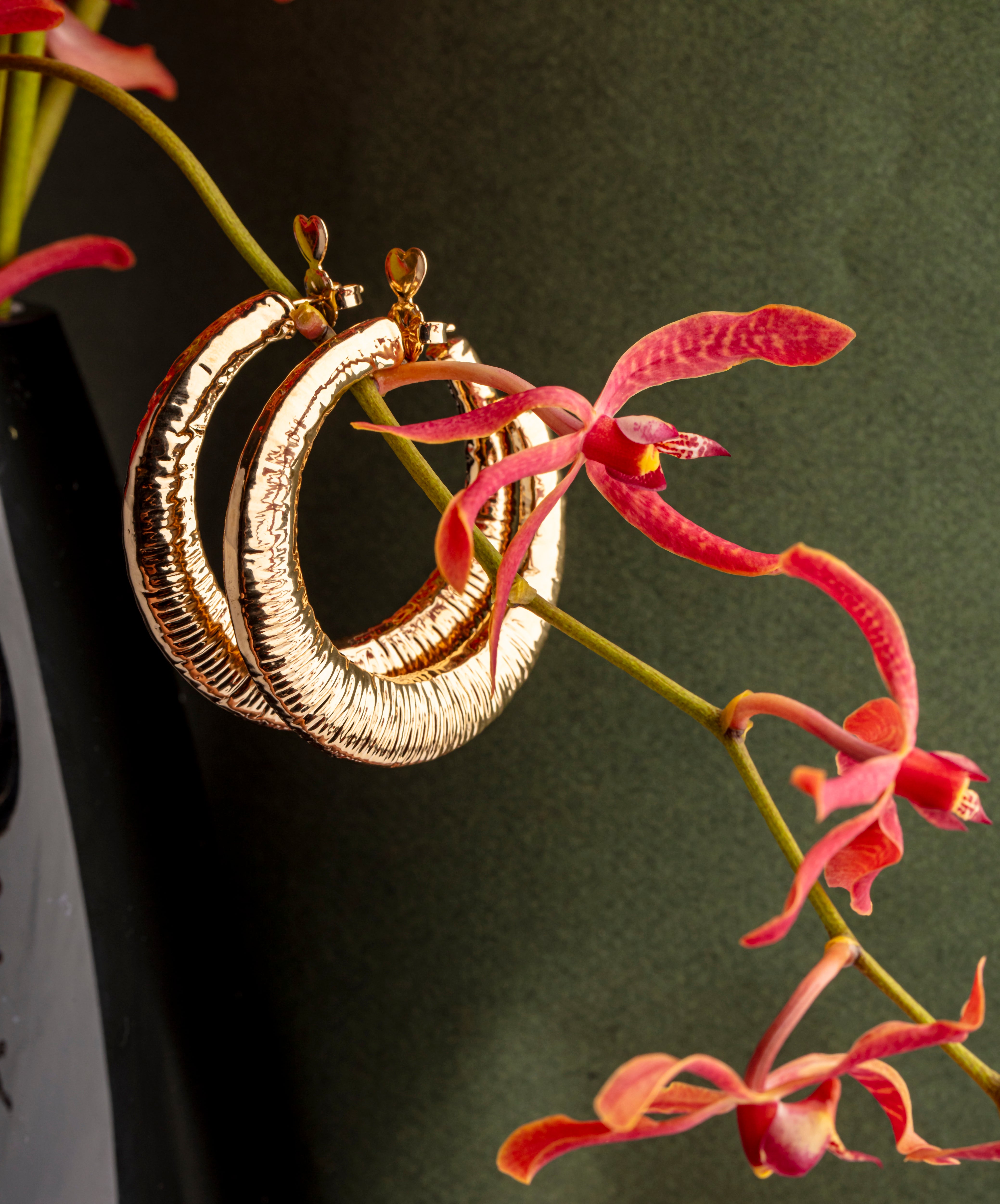 Gold plated open hoop earrings with subtle textured surface and lightweight design