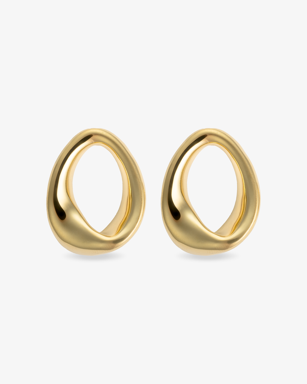 Sculptural open oval gold statement earrings front view