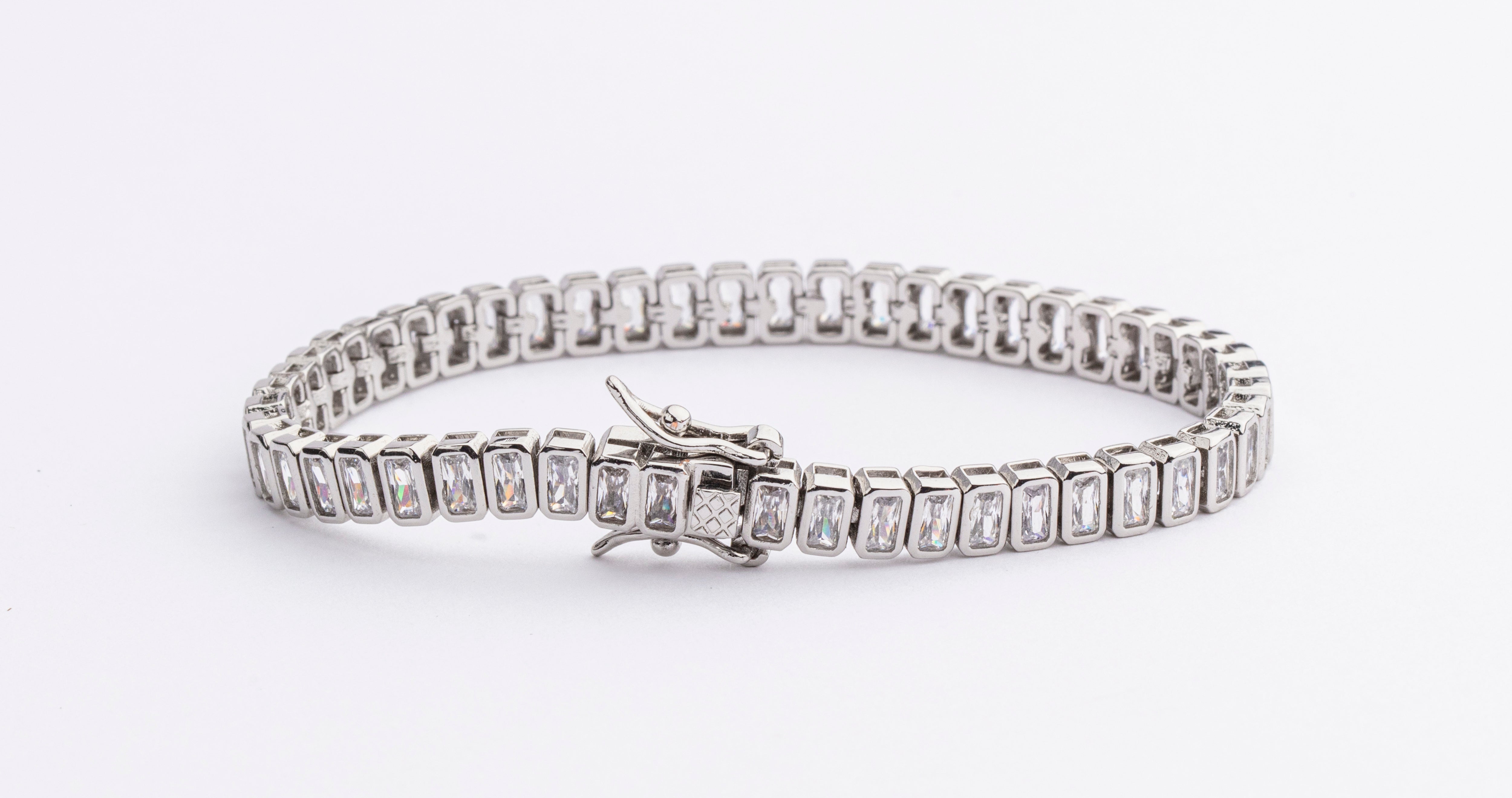 Cubic zirconia necklace available in gold plated and rhodium plated finishes with high shine