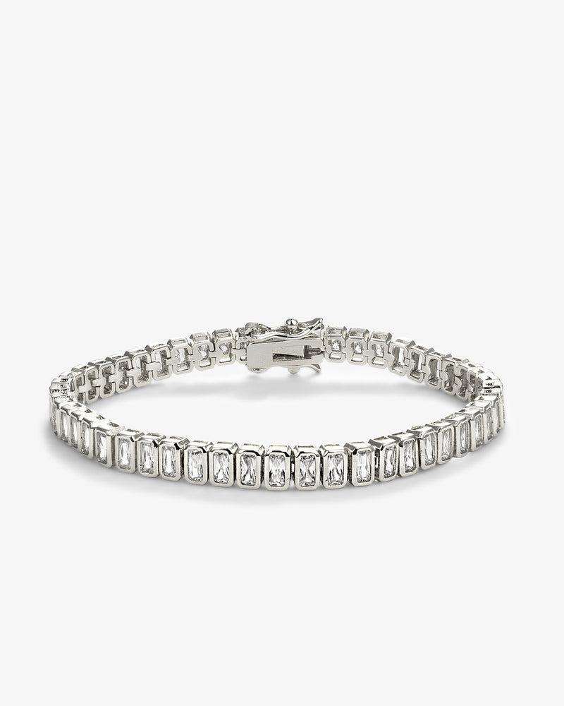 emerald-cut tennis bracelet featuring rectangular clear stones in polished silver settings