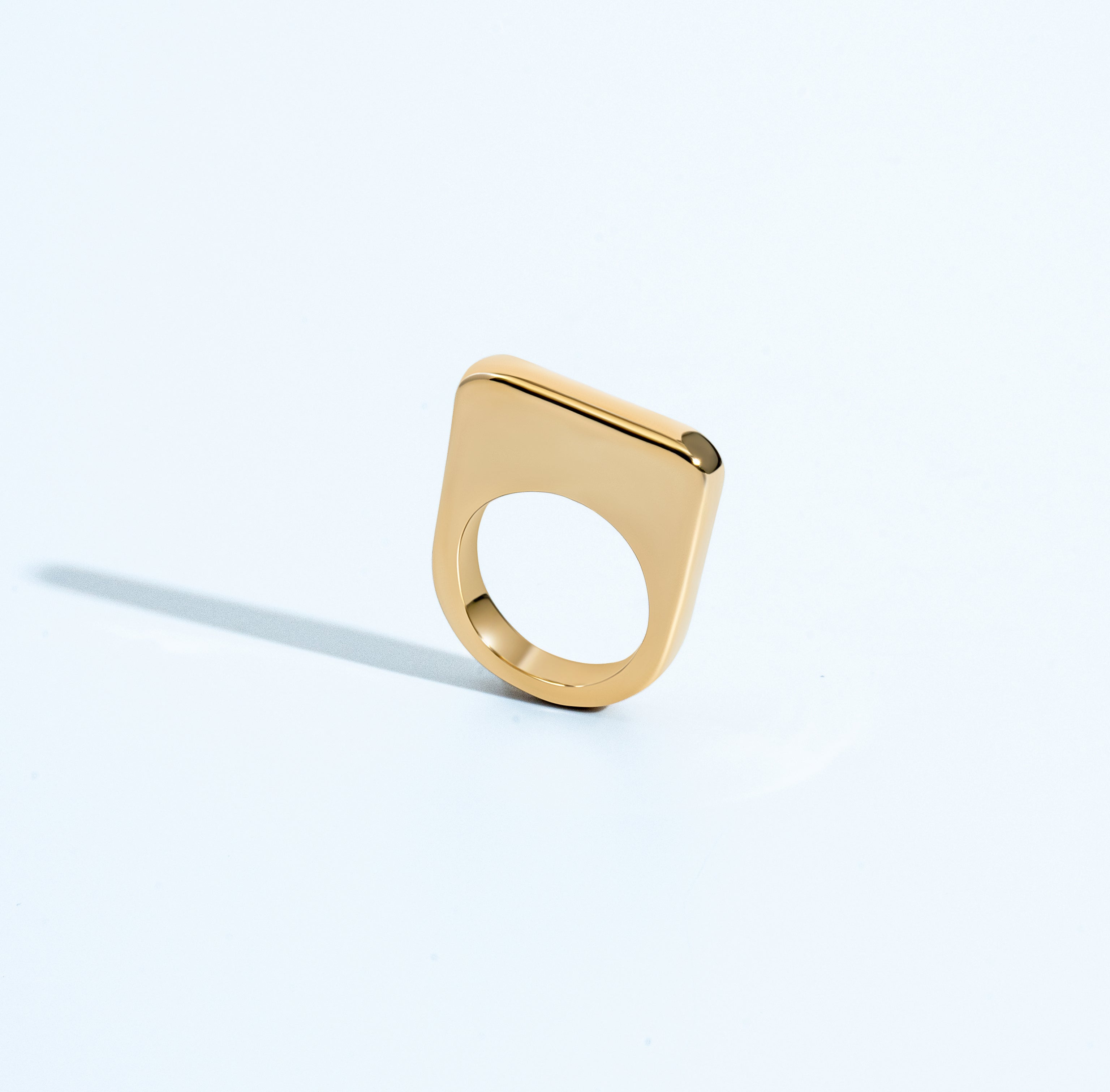 Geometric statement ring available in gold plated and rhodium plated finishes with sculptural square design