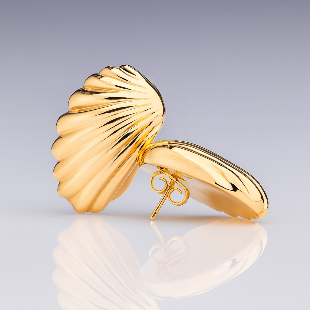 Gold plated wing inspired earrings with layered curved design and polished finish