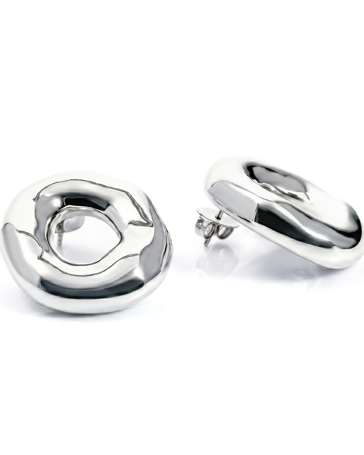 Melted circle earrings available in gold plated and rhodium plated finishes with sculptural curved design