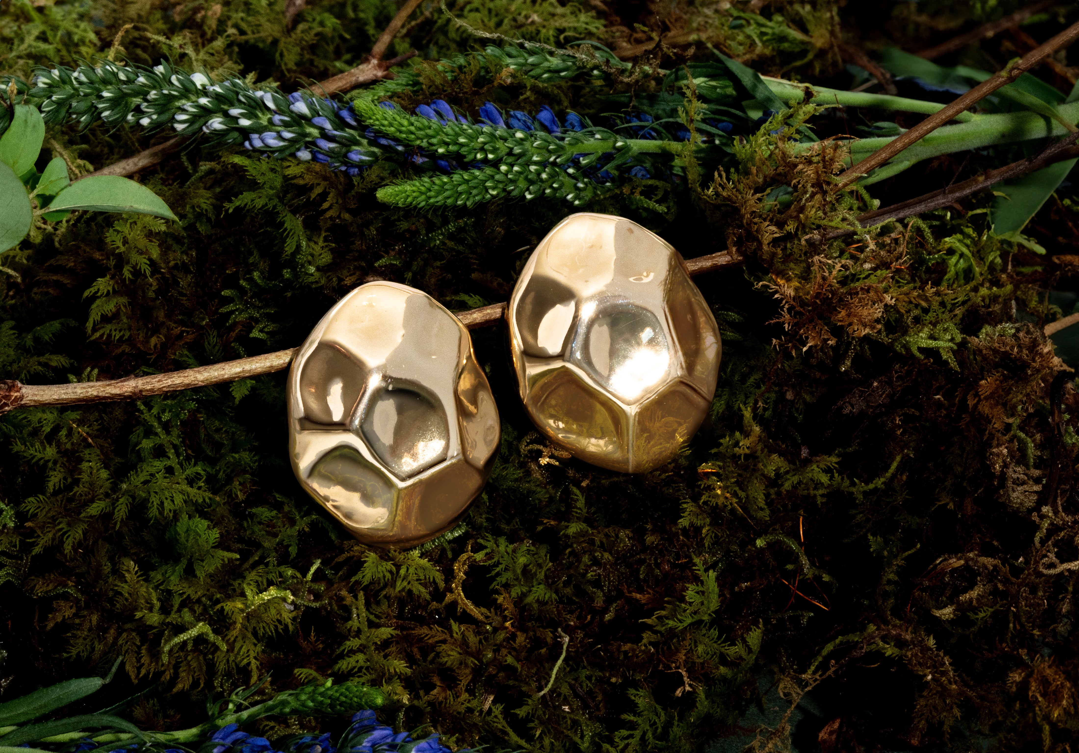 Gold dome earrings with organic sculptural shape and polished curved surface