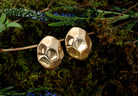 Gold dome earrings with organic sculptural shape and polished curved surface