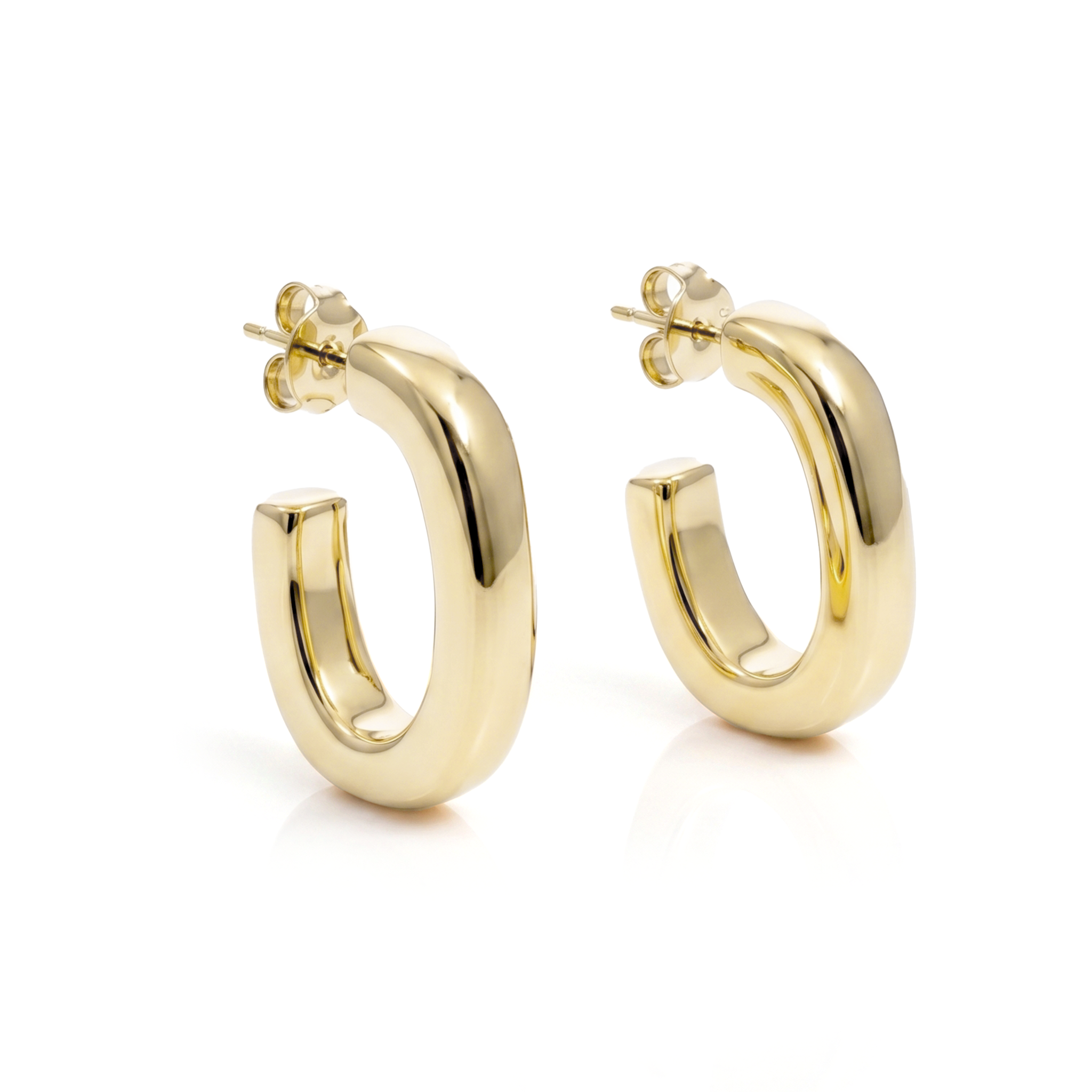 Oval open hoop earrings available in gold plated and rhodium plated finishes with sculptural curved design