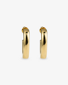 Chunky gold J-hoop earrings front view