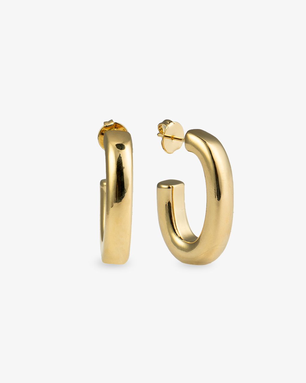 Chunky gold J-hoop earrings angled side view with post back