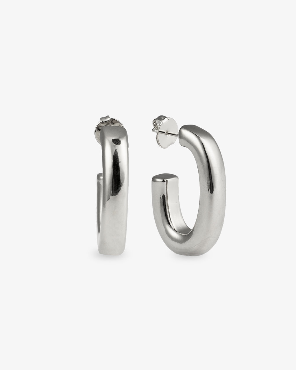 Chunky gold J-hoop earrings angled side view with post back