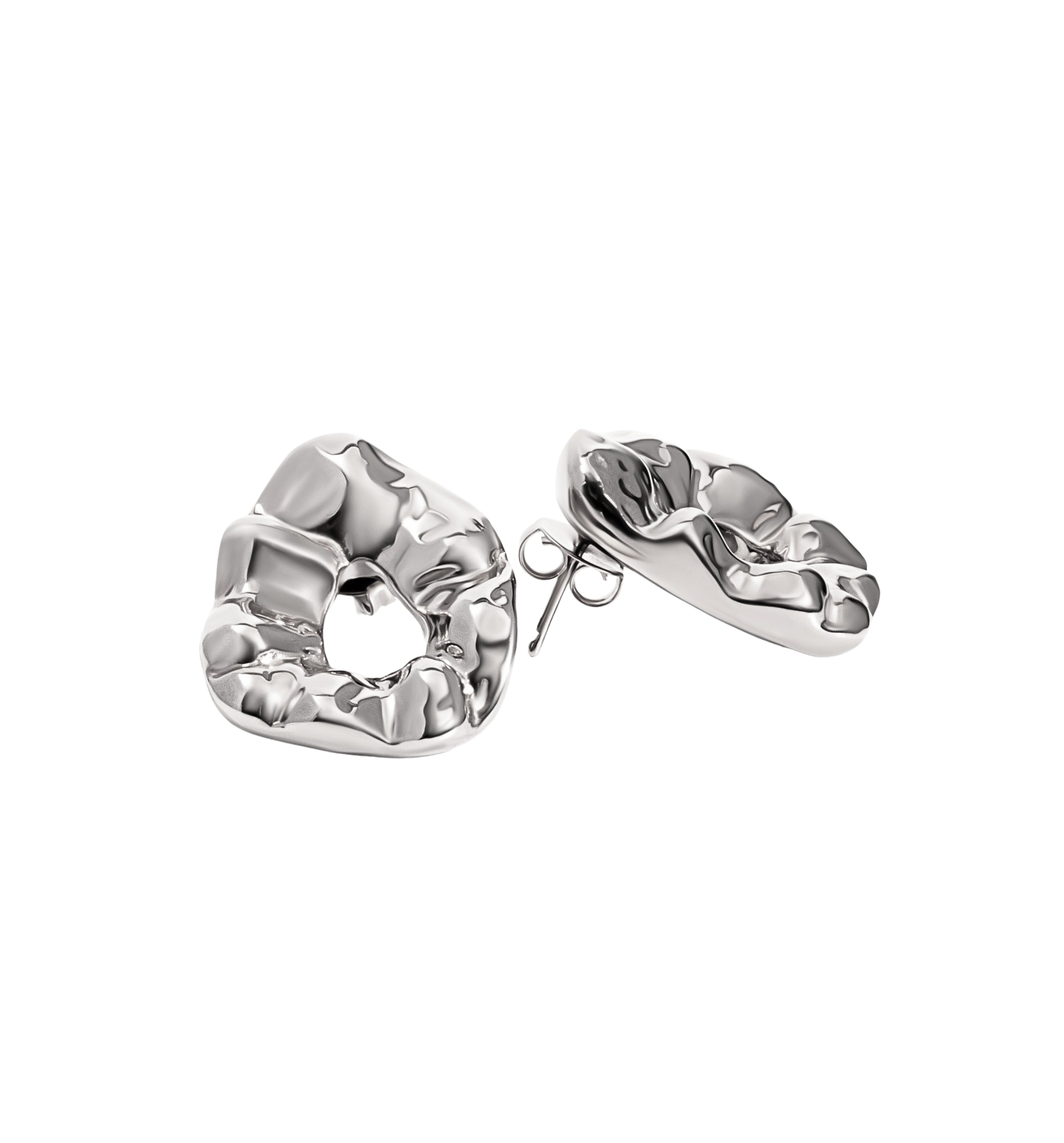 Sculptural hammered earrings available in gold plated and rhodium plated finishes with organic texture