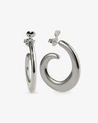 Chunky spiral silver hoop earrings with open curved shape and polished finish