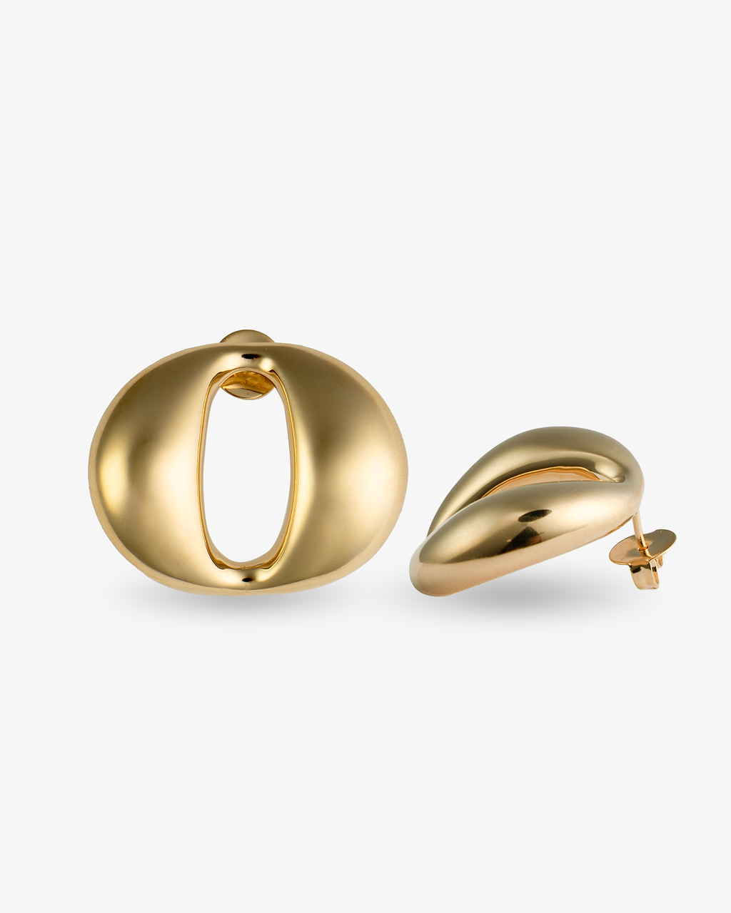Sculptural oval open-center gold statement earrings with smooth polished finish