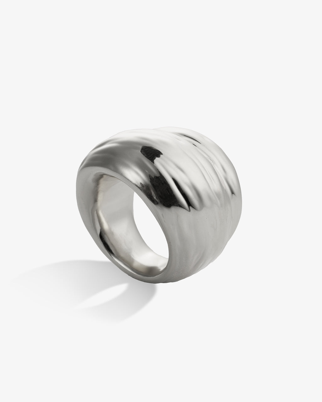 Polished chunky silver ring side view with curved sculptural design