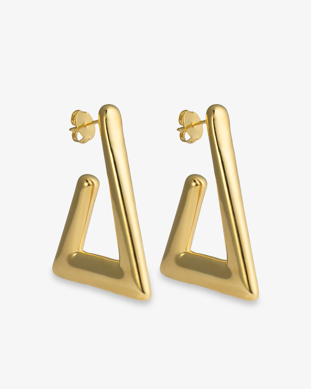 Open triangle gold statement earrings angled side view